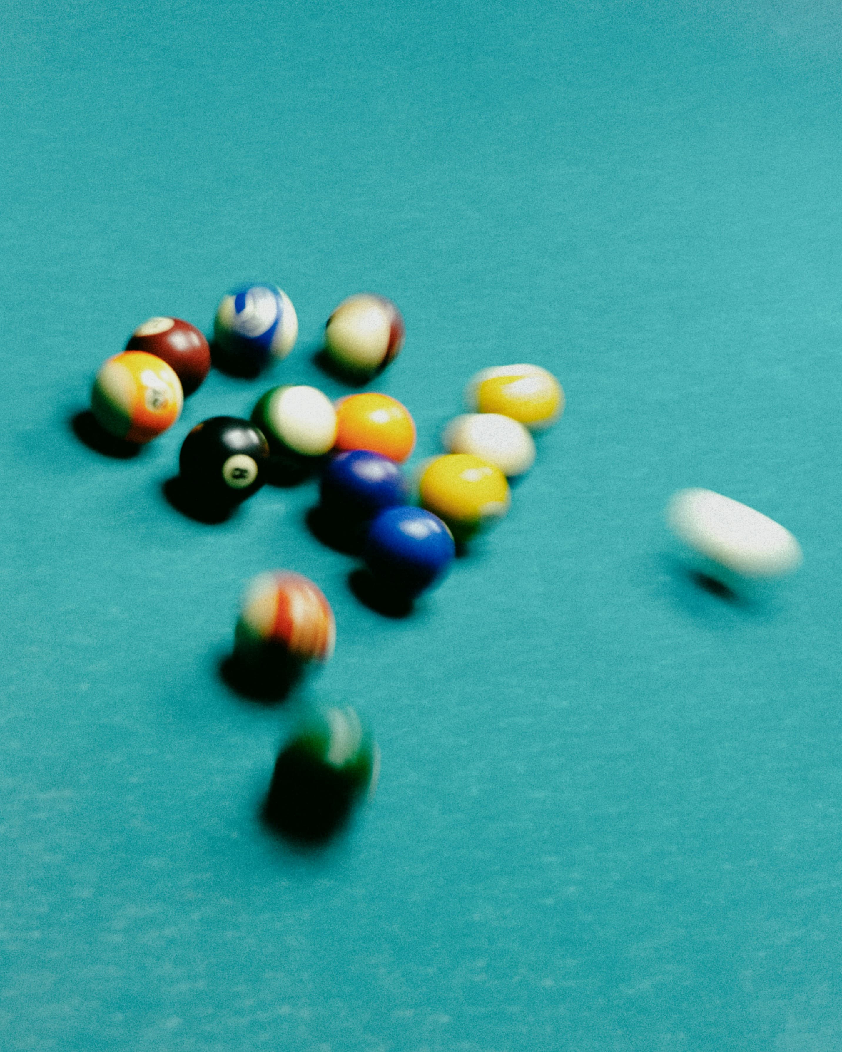Gaming room with billiards table and lounge seating